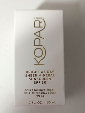Kopari Sheer Mineral Sunscreen SPF 50 in white and gold lettering